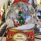 Globo de neve com Noel na poltrona 26cm