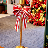 Castiçal em metal com laço vermelho e branco 35cm